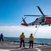 US Coast Guard Cutter Calhoun conducts in-flight refueling with Air Station Elizabeth City