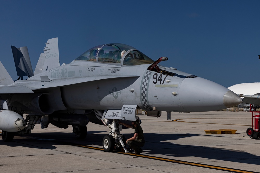 U.S. Marines with VMFA-312 fly F/A-18 Hornets