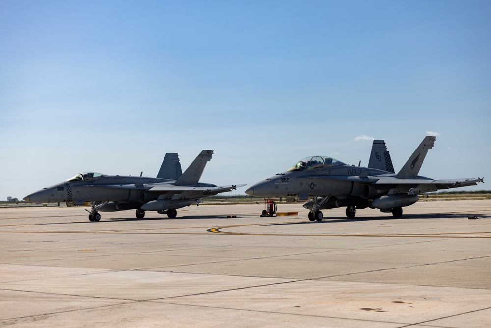 U.S. Marines with VMFA-312 fly F/A-18 Hornets