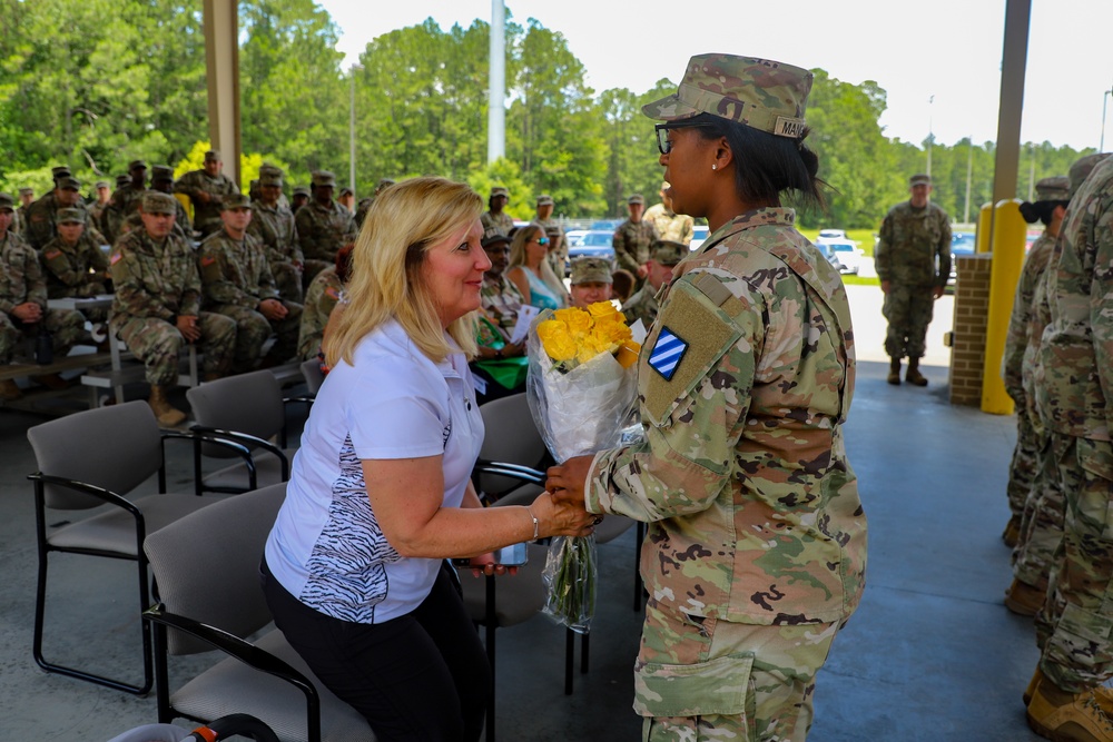 Commanders Pass Company Guidon in Change of Command