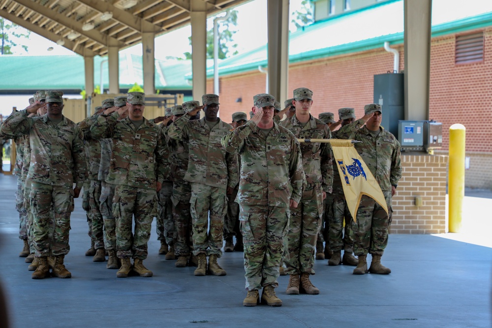 Commanders Pass Company Guidon in Change of Command