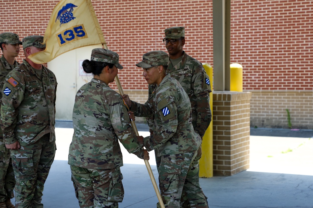 Commanders Pass Company Guidon in Change of Command