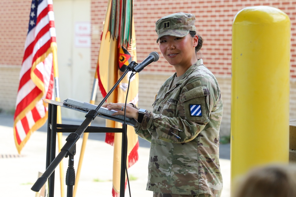 Commanders Pass Company Guidon in Change of Command