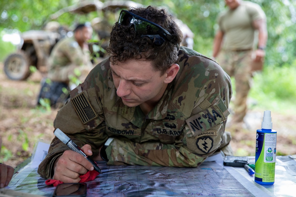 JPMRC-X | 2-27 Infantry Regiment Soldiers plan defensive positions in Tactical Action Center