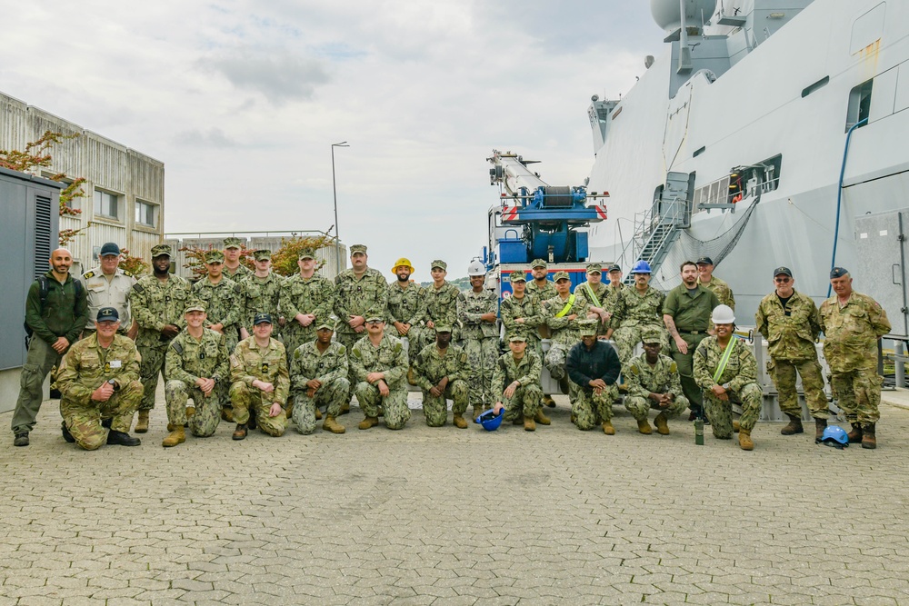 NCHB 1 and Danish Navy load missiles