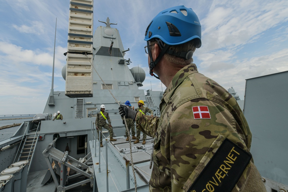 NCHB 1 and Danish Navy load missiles