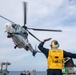 USS Russell (DDG 59) receives over 100 pallets worth of supplies during a vertical replenishment with USNS Wally Schirra (T-AKE 8)