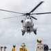 USS Russell (DDG 59) conducts a vertical replenishment with USNS Wally Schirra (T-AKE 8)