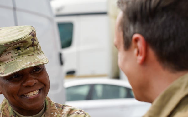 Brig. Gen. Tomika Seaberry speaks with locals during DDay 80 Commemoration
