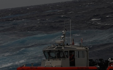 US Coast Guard Cutter Stone conducts small boat operations with USS Donald Cook