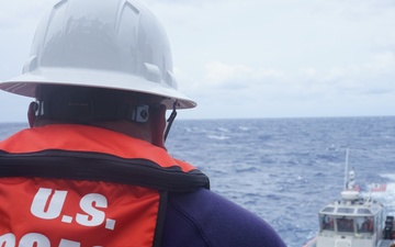 US Coast Guard Cutter Stone conducts small boat operations with USS Donald Cook