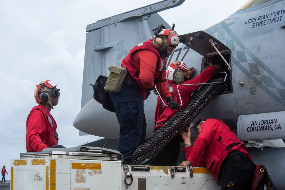 USS Ronald Reagan (CVN76) Sailors conduct flight deck operations
