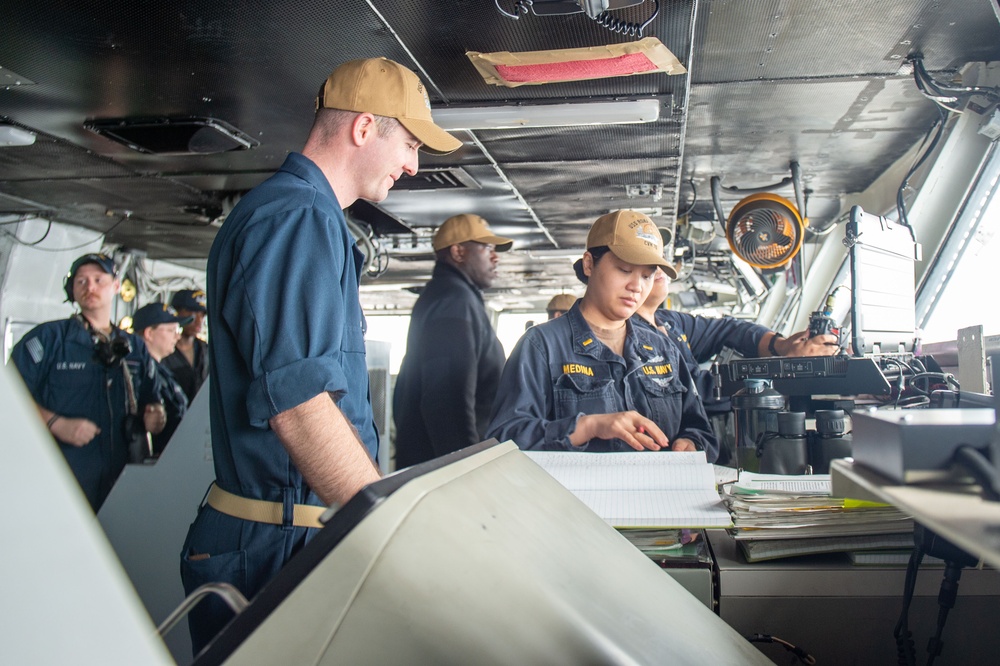 USS Ronald Reagan (CVN 76) Sailors stand watch in the pilot house