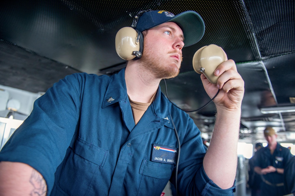 USS Ronald Reagan (CVN 76) Sailors stand watch in the pilot house