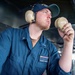 USS Ronald Reagan (CVN 76) Sailors stand watch in the pilot house