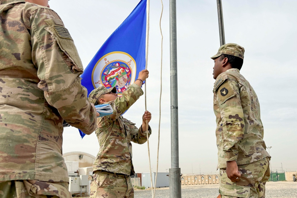 Soldiers raise new Minnesota Flag for the first time