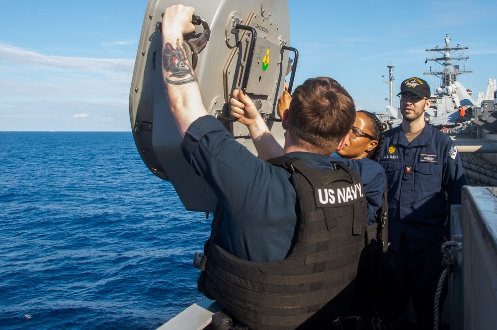 USS Ronald Reagan (CVN76) Sailors set full-bore