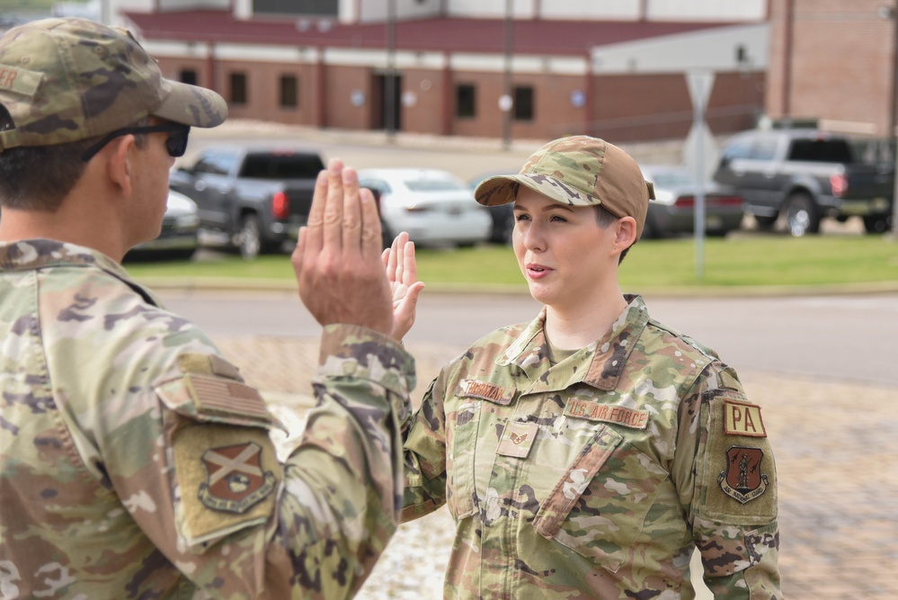 Staff Sgt. Shelby Thurman reenlists into the Air National Guard