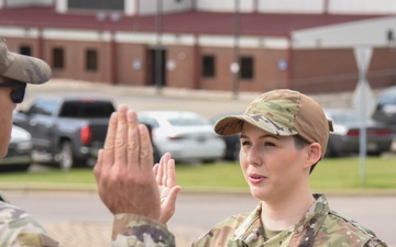 Staff Sgt. Shelby Thurman reenlists into the Air National Guard