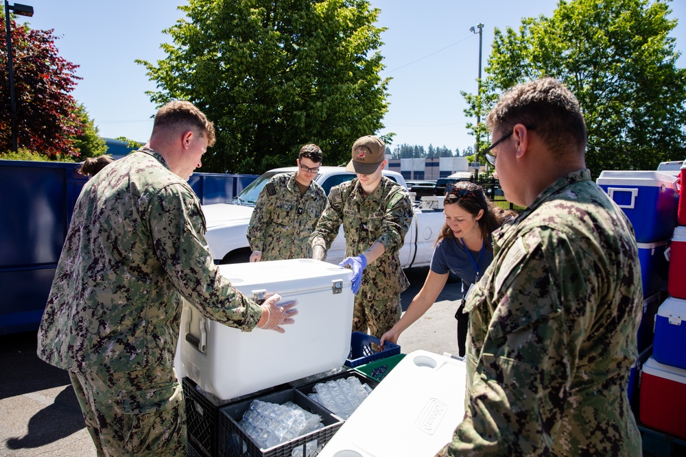 Sailors Volunteer at the Share Community Center