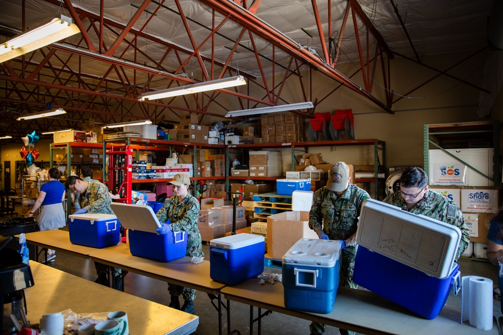 Sailors Volunteer at the Share Community Center