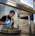 USS Carl Vinson (CVN 70) Sailor Prepares to Serve Lunch