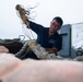 USS Carl Vinson (CVN 70) Sailor Repairs a Mooring Line