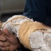 USS Carl Vinson (CVN 70) Sailor Repairs a Mooring Line