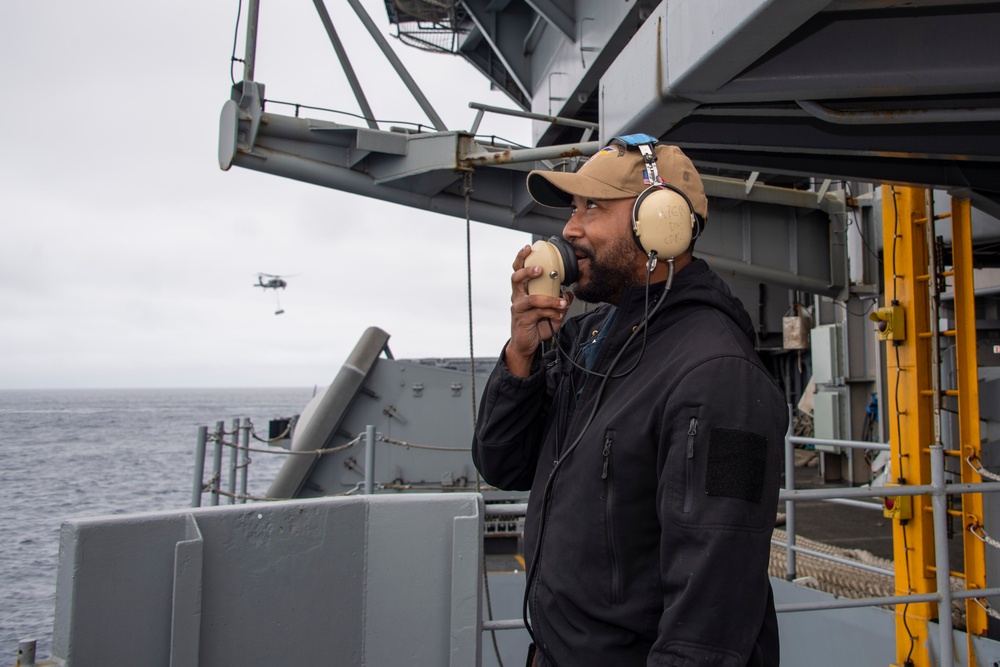 Sailor Stands Watch on the Fantail of USS Carl Vinson (CVN 70)