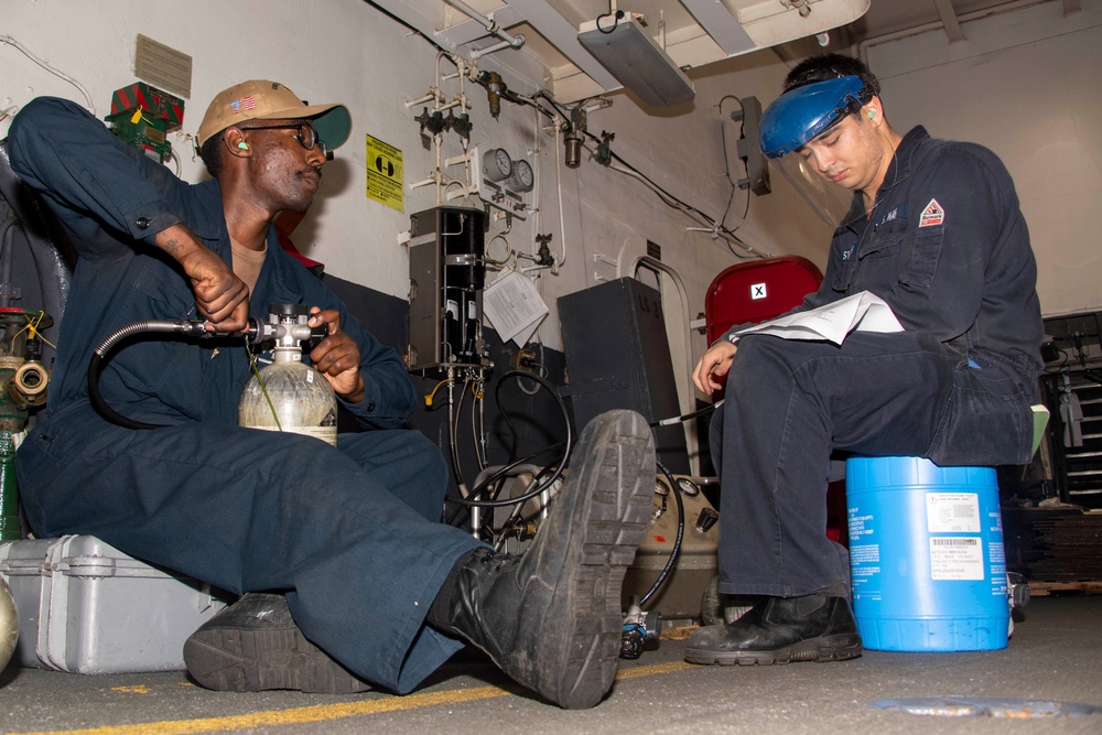 Sailors Recharge Self-Contained Breathing Apparatus Aboard USS Carl Vinson (CVN 70)