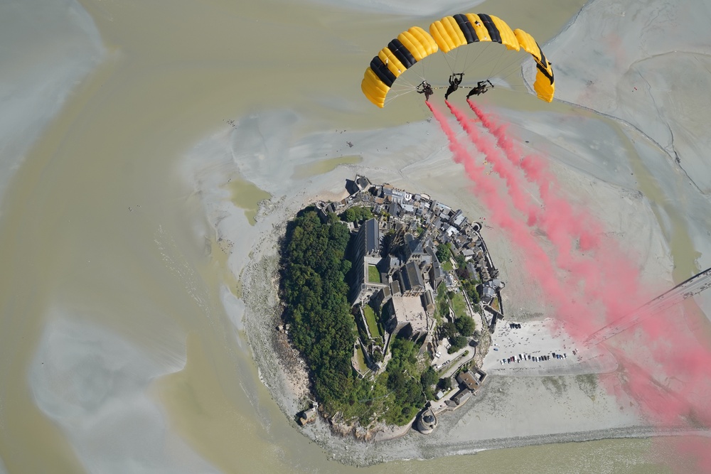 Soldiers from Army Golden Knights jump at Mont Saint- Michel Normandy, France for D-Day commemoration ceremonies