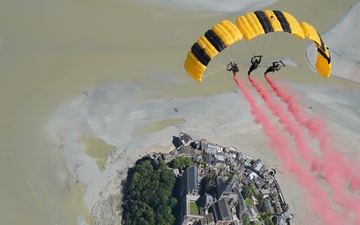 Soldiers from Army Golden Knights jump at Mont Saint- Michel Normandy, France for D-Day commemoration ceremonies