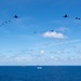 USS Ronald Reagan (CVN 76) steams in formation with 7th Fleet ships, Japan Maritime Self-Defense Force ships, as U.S. Navy, U.S. Air Force and Japan Air Self-Defense Force aircraft fly over in support of Valiant Shield 2024