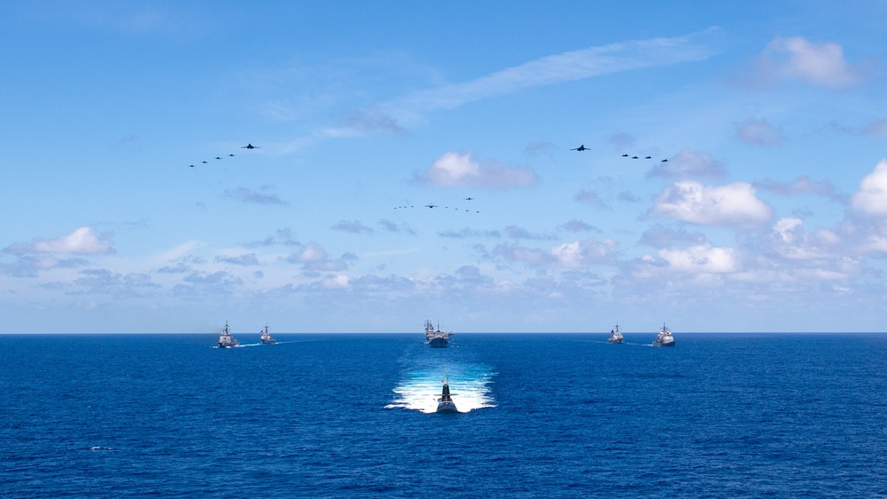 USS Ronald Reagan (CVN 76) steams in formation with 7th Fleet ships, Japan Maritime Self-Defense Force ships, as U.S. Navy, U.S. Air Force and Japan Air Self-Defense Force aircraft fly over in support of Valiant Shield 2024