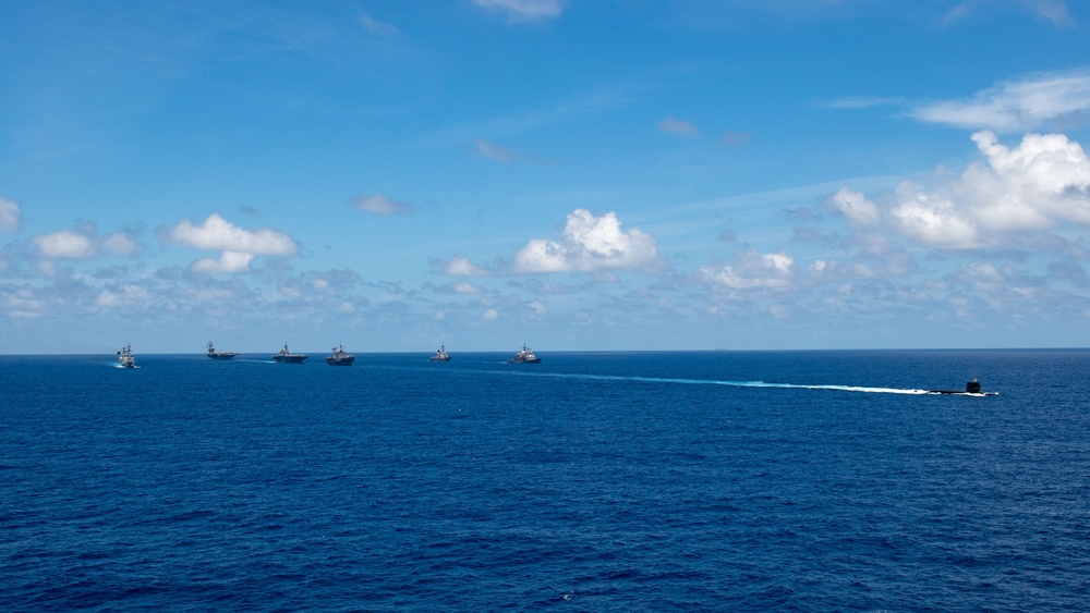 USS Ronald Reagan (CVN 76) steams in formation with 7th Fleet ships, Japan Maritime Self-Defense Force ships, as U.S. Navy, U.S. Air Force and Japan Air Self-Defense Force aircraft fly over in support of Valiant Shield 2024