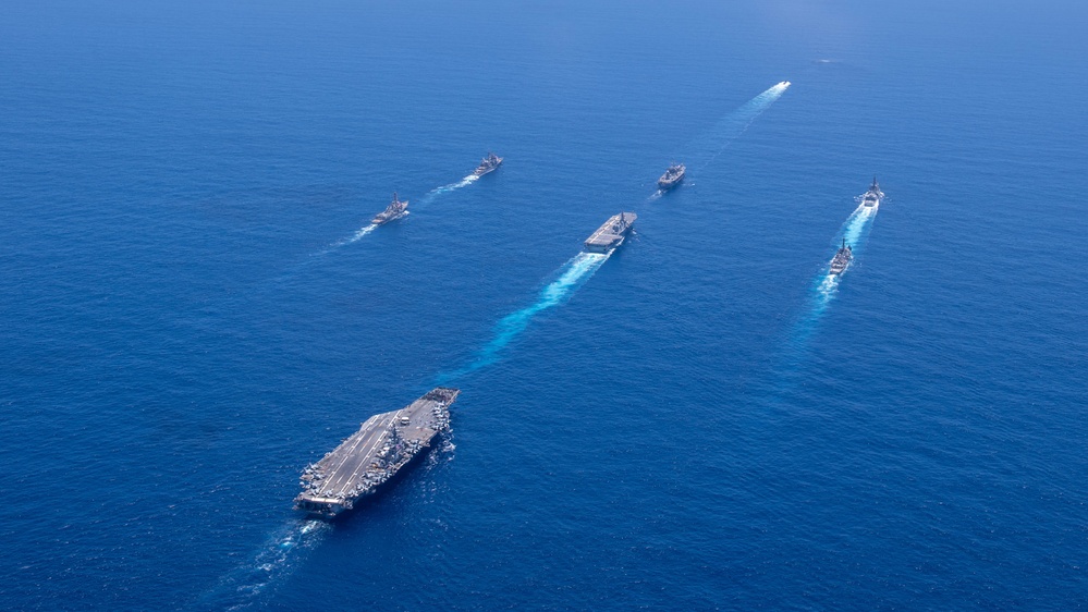 USS Ronald Reagan (CVN 76) steams in formation with 7th Fleet ships, Japan Maritime Self-Defense Force ships, as U.S. Navy, U.S. Air Force and Japan Air Self-Defense Force aircraft fly over in support of Valiant Shield 2024