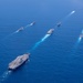 USS Ronald Reagan (CVN 76) steams in formation with 7th Fleet ships, Japan Maritime Self-Defense Force ships, as U.S. Navy, U.S. Air Force and Japan Air Self-Defense Force aircraft fly over in support of Valiant Shield 2024