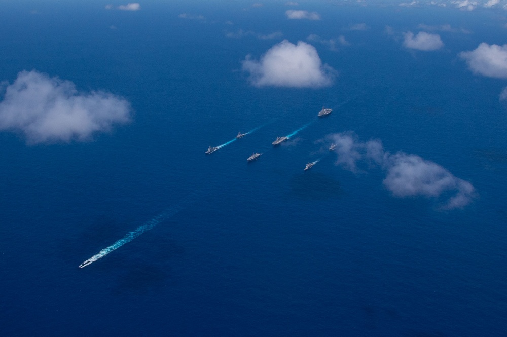 USS Ronald Reagan (CVN 76) steams in formation with 7th Fleet ships, Japan Maritime Self-Defense Force ships, as U.S. Navy, U.S. Air Force and Japan Air Self-Defense Force aircraft fly over in support of Valiant Shield 2024