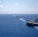 USS Ronald Reagan (CVN 76) steams in formation with 7th Fleet ships, Japan Maritime Self Defense Force ships, as U.S. Navy, U.S. Air Force and Japan Air Self-Defense Force aircraft fly over in support of Valiant Shield 2024