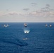 USS Ronald Reagan (CVN 76) steams in formation with 7th Fleet ships, Japan Maritime Self Defense Force ships, as U.S. Navy, U.S. Air Force and Japan Air Self-Defense Force aircraft fly over in support of Valiant Shield 2024