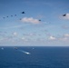 USS Ronald Reagan (CVN 76) steams in formation with 7th Fleet ships, Japan Maritime Self Defense Force ships, as U.S. Navy, U.S. Air Force and Japan Air Self-Defense Force aircraft fly over in support of Valiant Shield 2024