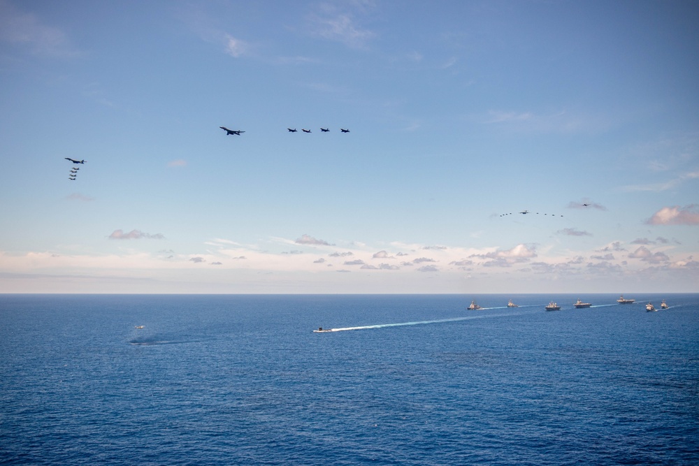 USS Ronald Reagan (CVN 76) steams in formation with 7th Fleet ships, Japan Maritime Self Defense Force ships, as U.S. Navy, U.S. Air Force and Japan Air Self-Defense Force aircraft fly over in support of Valiant Shield 2024