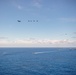 USS Ronald Reagan (CVN 76) steams in formation with 7th Fleet ships, Japan Maritime Self Defense Force ships, as U.S. Navy, U.S. Air Force and Japan Air Self-Defense Force aircraft fly over in support of Valiant Shield 2024