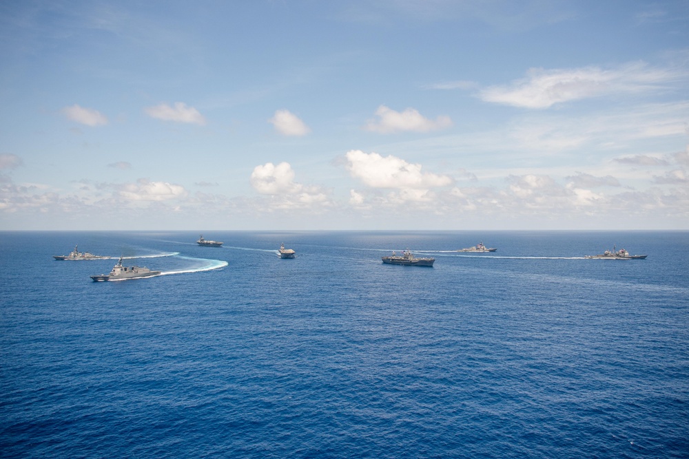 USS Ronald Reagan (CVN 76) steams in formation with 7th Fleet ships, Japan Maritime Self Defense Force ships, as U.S. Navy, U.S. Air Force and Japan Air Self-Defense Force aircraft fly over in support of Valiant Shield 2024