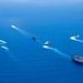 USS Ronald Reagan (CVN 76) steams in formation with 7th Fleet ships, Japan Maritime Self-Defense Force ships, as U.S. Navy, U.S. Air Force and Japan Air Self-Defense Force aircraft fly over in support of Valiant Shield 2024