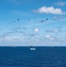 USS Ronald Reagan (CVN 76) steams in formation with 7th Fleet ships, Japan Maritime Self-Defense Force ships, as U.S. Navy, U.S. Air Force and Japan Air Self-Defense Force aircraft fly over in support of Valiant Shield 2024