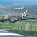 D-Day 80 celebrates with legacy C-47s flying over Omaha Beach