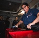 USS George Washington Sailors perform weapon assembly