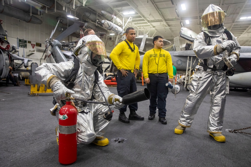 Sailors aboard Abraham Lincoln conduct firefighting training