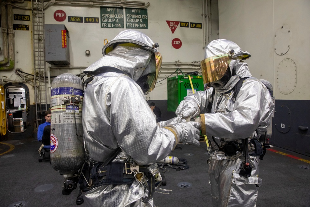 Sailors aboard Abraham Lincoln conduct firefighting training